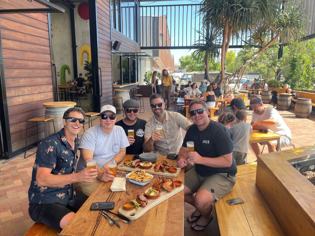 Group of Dad's enjoying a brewery and distillery tour for unique Father's Day Gift